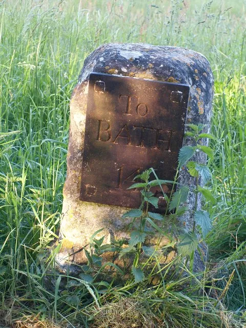 Milestone, Bewley Common 14 miles from Bath according to the metal plate on this milestone by the road on the common, southeast of 123268.