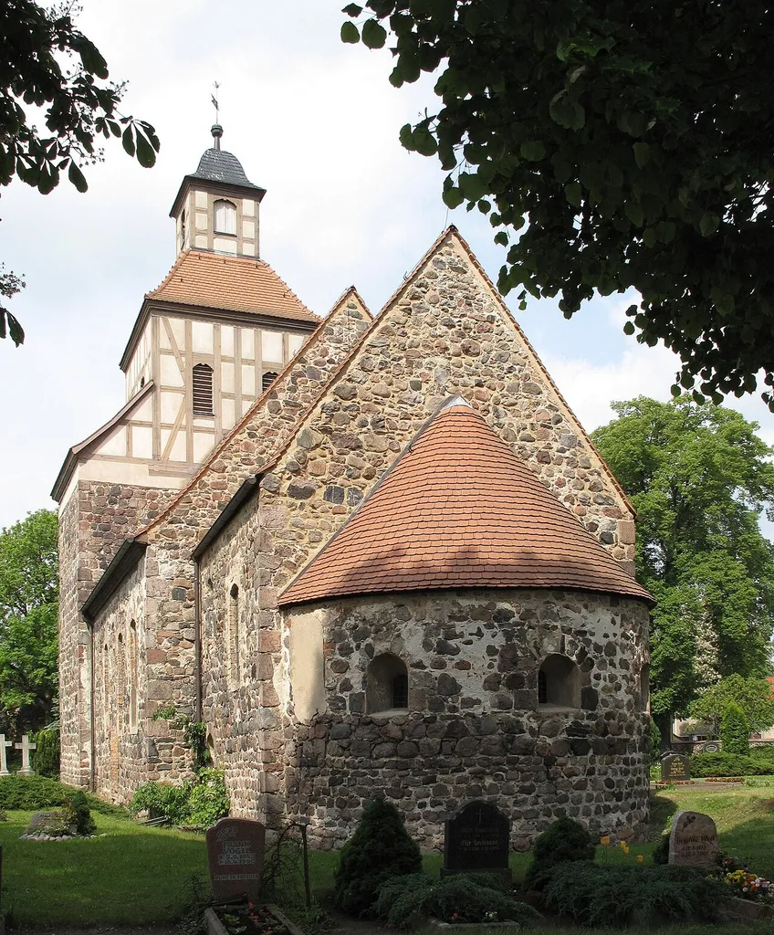 Village church Wildenbruch. Listed Fieldstone church, built in the 13th century. The timber framed addition on the center of the west tower was built in 1737 and after modifications in the meantime1992 reconstructed according to the plans from 1737. Contrary to many different depictions it is no Fortified church (german: Wehrkirche). Wildenbruch is a part of Michendorf in the district Potsdam-Mittelmark, state Brandenburg, Germany.