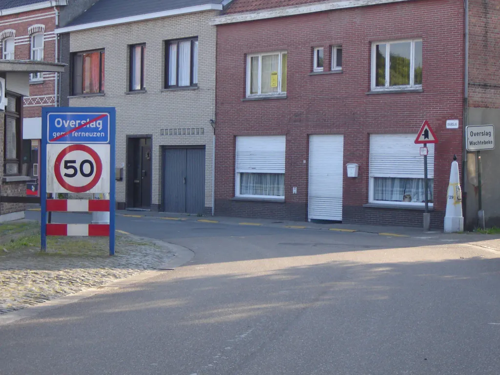 Belgian-Dutch border in Overslag, looking from the Netherlands towards the Belgium. At the left: border post no.298 (blocked by signboard), at the right border post no.299. Nowadays Belgian-Dutch border. Overslag, Wachtebeke, East Flanders, Belgium Overslag, Terneuzen, Zeeland, Netherlands