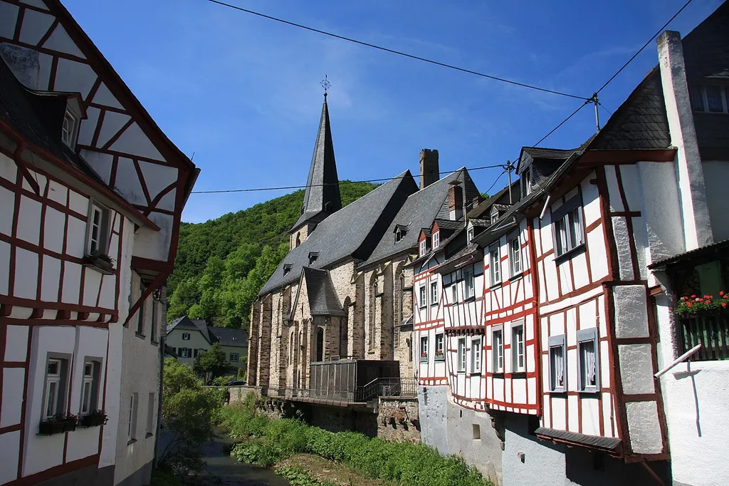 View alon the rivulet Eltzbach to the Church Feast of the Cross in Monreal