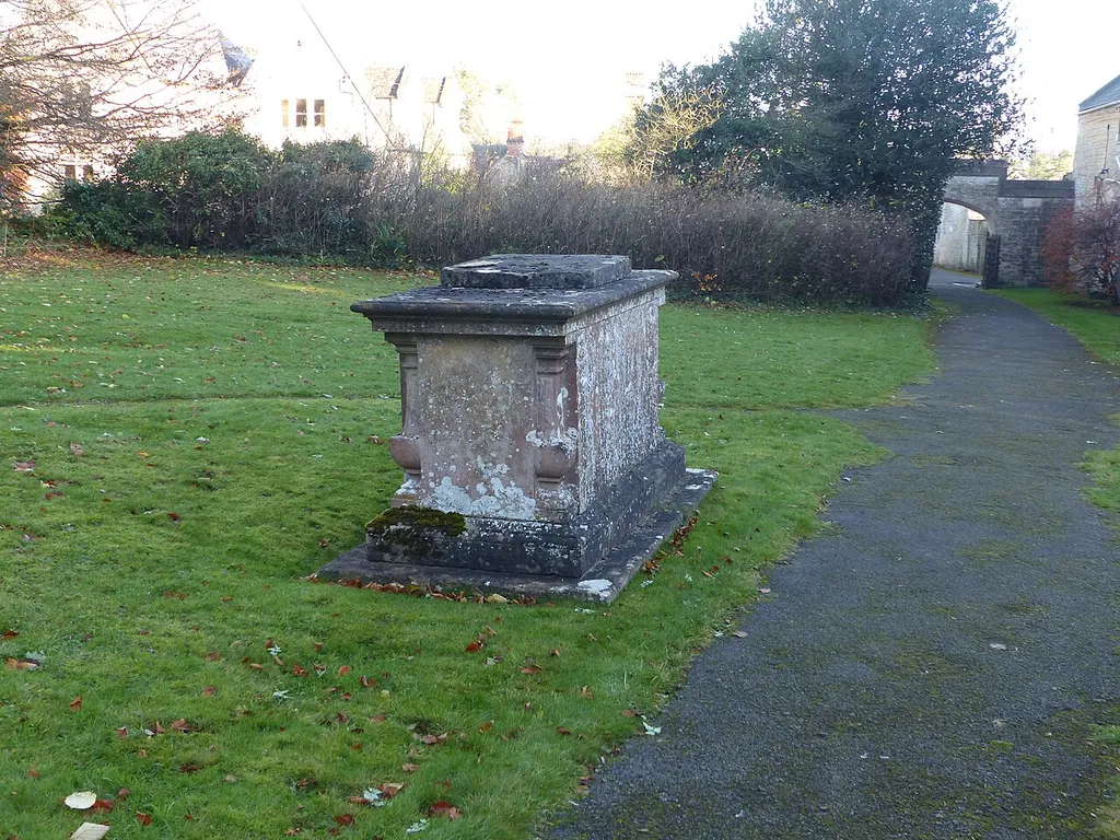 Grade II listed chest tomb in the churchyard of St John The Baptist, Coln St. Aldwyns, Gloucestershire. Listed as "John Smith monument in the churchyard approximately 10 metres south east of chancel to church of St John the Baptist". .mw-parser-output .messagebox{margin:4px 0;width:auto;border-collapse:collapse;border:2px solid var(--border-color-progressive,#6485d1);background-color:var(--background-color-neutral-subtle,#fbfcff);color:var(--color-base,#202122);box-sizing:border-box;border-inline-start-width:8px}.mw-parser-output .messagebox.mbox-small{font-size:88%;line-height:1.25em}.mw-parser-output .mbox-warning,.mw-parser-output .mbox-speedy{border:2px solid var(--border-color-error,#b22222);background:var(--background-color-error-subtle,#ffdbdb);border-inline-start-width:8px}.mw-parser-output .mbox-serious,.mw-parser-output .mbox-delete,.mw-parser-output .mbox-stop{border:2px solid var(--border-color-error,#b22222);border-inline-start-width:8px}.mw-parser-output .mbox-issue,.mw-parser-output .mbox-content{border:2px solid #f28500;background:var(--background-color-warning-subtle,#ffe);border-inline-start-width:8px}.mw-parser-output .mbox-query,.mw-parser-output .mbox-style{border:2px solid #f4c430;background:var(--background-color-warning-subtle,#ffe);border-inline-start-width:8px}.mw-parser-output .mbox-shit{border:2px solid #960;border-inline-start-width:8px}.mw-parser-output .mbox-license{border:2px solid #88a;border-inline-start-width:initial}.mw-parser-output .mbox-legal{border:2px solid var(--border-color-notice,#666);background:var(--background-color-base,#fff);border-inline-start-width:8px}.mw-parser-output .mbox-honor{border:2px solid #ca3;background:var(--background-color-warning-subtle,#fcf4db);border-inline-start-width:8px}.mw-parser-output .mbox-growth{border:2px solid #8d4;background:var(--background-color-success-subtle,#d5fdf4);border-inline-start-width:8px}.mw-parser-output .mbox-move{border:2px solid #93c;border-inline-start-width:8px}.mw-pars