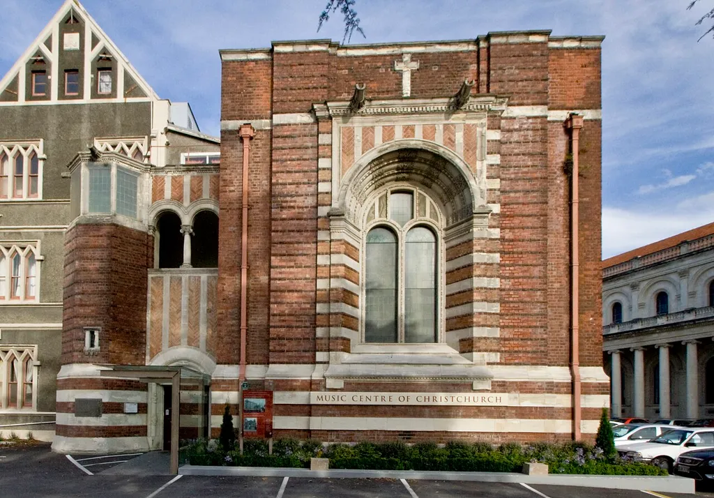 Convent (at left) built in 1882, chapel (a concert hall until 2011) in 1907. Signboard reads: This chapel is unique in New Zealand. It is the only fully realised example of a Byzantine revivalist structure. Stand back and compare its rich ornamentation to the austere neo-Gothic style of the main convent.