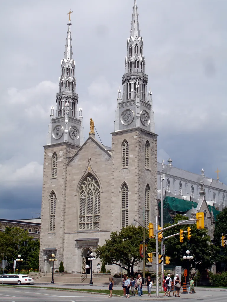 This is Ottawa's oldest church, built on the site of St. Jacques Church, demolished in 1841. The original design was to be Neoclassical, but after the lower section was built, a Neo-Gothic design was adopted instead. The main structure was finished in 1846, but the spires were not installed until 1866.