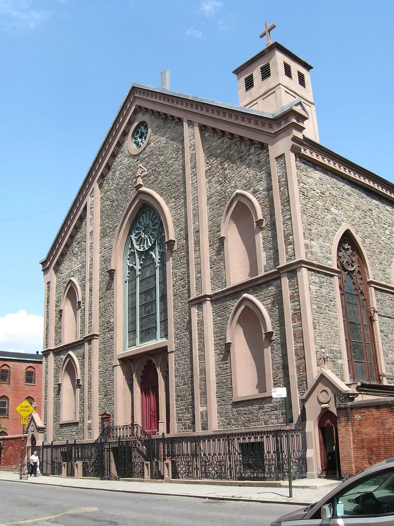 Looking northeast at the front (Mulberry Street) side of en:St. Patrick's Old Cathedral, New York on a sunny midday