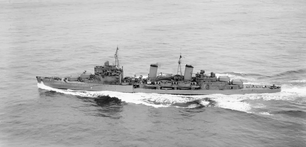 Aerial view of HMS EDINBURGH, 'Southampton' class (third group) cruiser in Scapa Flow, October 1941