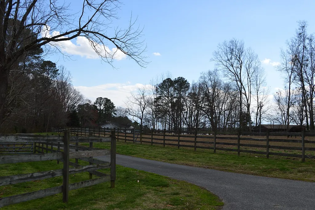 Overview of the site of the first Denbigh Parish Church, located above the confluence of Church Creek and the Warwick River, off Miller Road, in Newport News, Virginia, United States. The site is listed on the National Register of Historic Places.