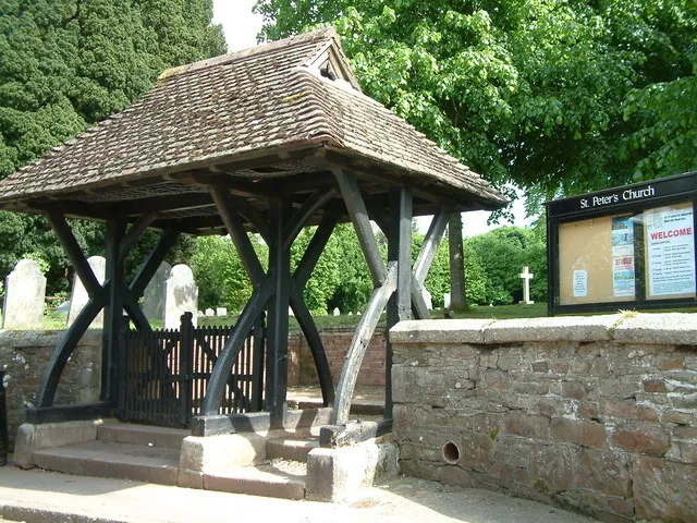 Lych gate to St Peter's parish churchyard, Market Street, North Tawton, Devon, seen from the northwest