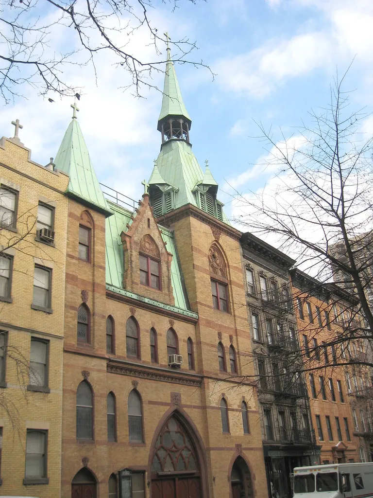 Looking east across 83d Street at Roman Catholic Church of St Elizabeth of Hungary on a cloudy afternoon. ZIP 10028.