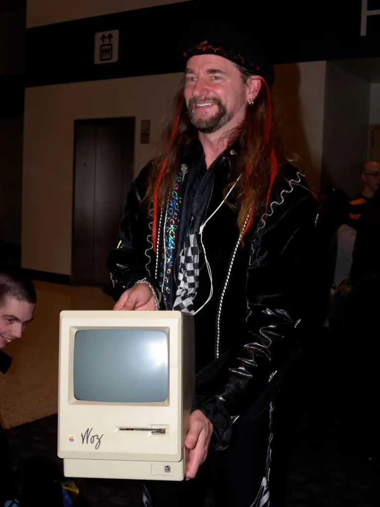 Bruce Damer demonstrates an early macintosh computer signed by Apple cofounder Steve Wozniak. Pictue taken after the premier of the documentary film "MacHEADS" at Macworld 2009.