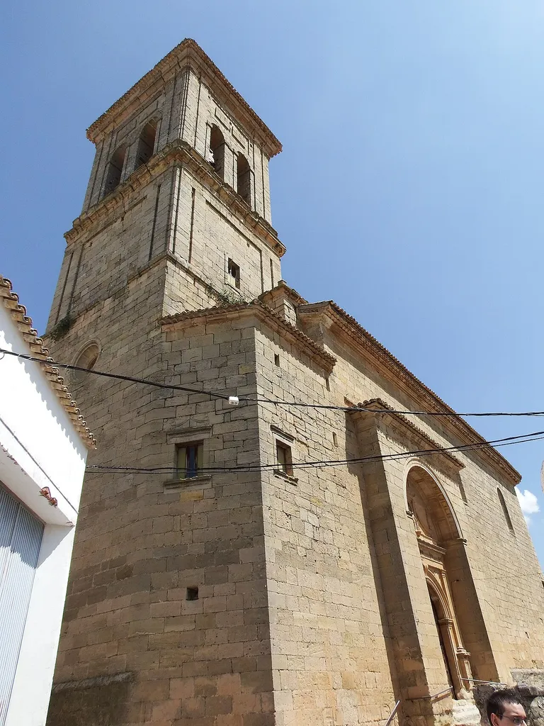 Villar y Velasco. Cuevas de Velasco, iglesia y campanario.