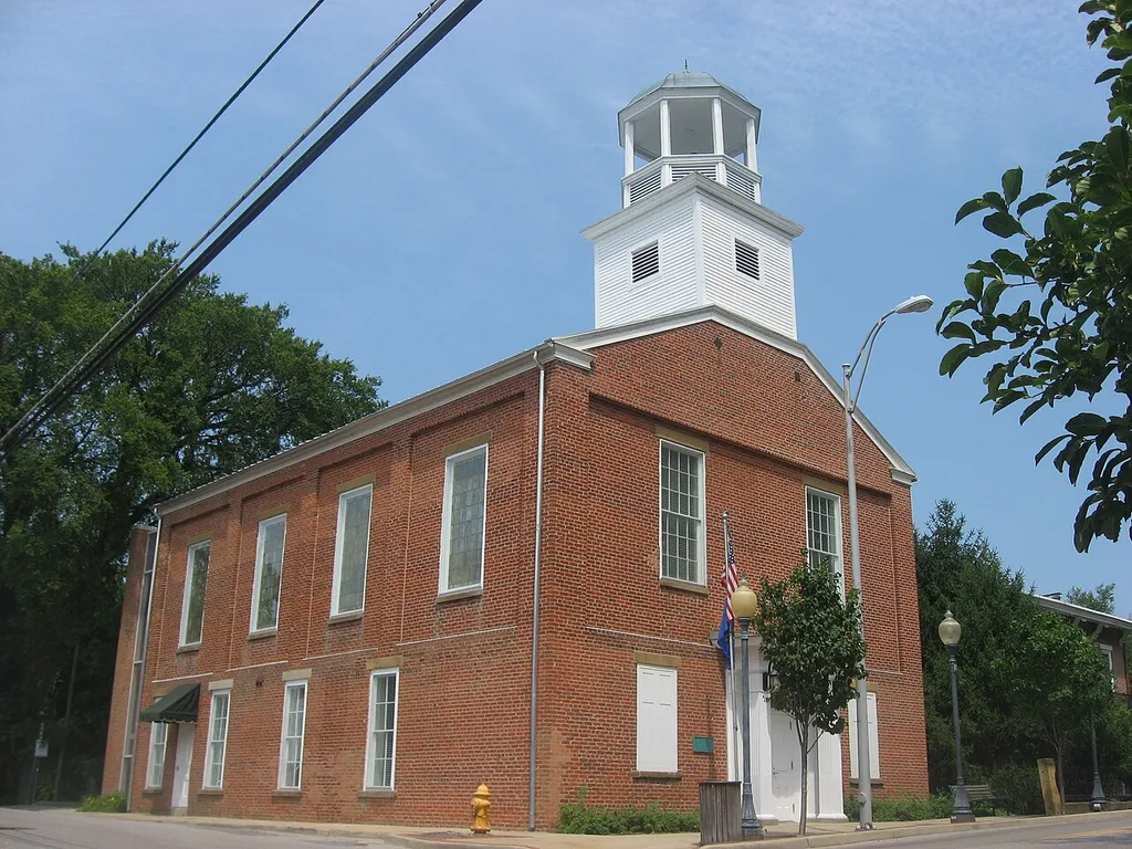 Front and southern side of the Old Newburgh Presbyterian Church, located on the northwestern corner of the junction of State and Main Streets in downtown Newburgh, Indiana, United States. Built in 1851 for a congregation of the Cumberland Presbyterian Church, it is now Newburgh's town hall, and it is listed on the National Register of Historic Places.