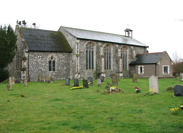 The church of St Mary in Burston. St Mary's church - it lost its tower in the 18th century - in the village of Burston adjoins the village green and the Burston Strike School > 1773265. When the teachers Mr and Mrs Higdon in 1914 clashed with the parson and the county education committee they were evicted from the school house and opened a rival school in 1917, with local support and the national trades union backing. The Strike School closed in 1939 and now houses a museum. Services are still being held in St Mary's church. However, the nave > 1773301 has been cleared of pews, functioning as a community room where concerts, art exhibitions, coffee mornings and other fund-raising events are being held. The chancel is separated from the nave by a wrought-iron screen > 1773305 with a door in it. The pulpit > 1773323 remains in its place as do the 14th century font > 1773331 and a fine set of royal arms > 1773334 for James I still hangs on the west wall.