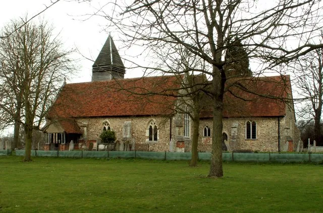 St. Mary's church, West Bergholt, Essex. This church is mainly 14th century but the wooden belfry is 15th century. It stands close to the hall.