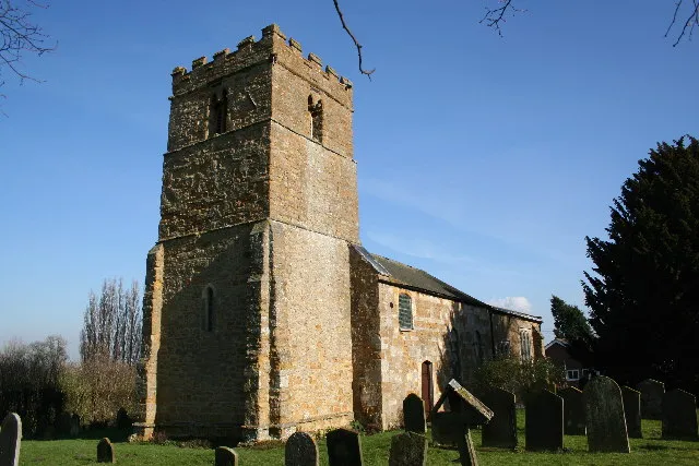 St.Andrew's church, Kirkby, Lincs. There are several Kirkbys in Lincolnshire, this one known as Kirkby-cum-Osgodby. St.Andrew's church has an Early English tower and chancel, the nave was rebuilt in 1825. There are two interesting late 14th century tomb chests to John Wildbore and his wife inside.