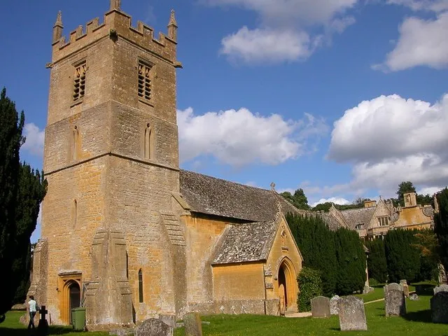Stanway. Saint Peter's Church with Stanway House in the background.