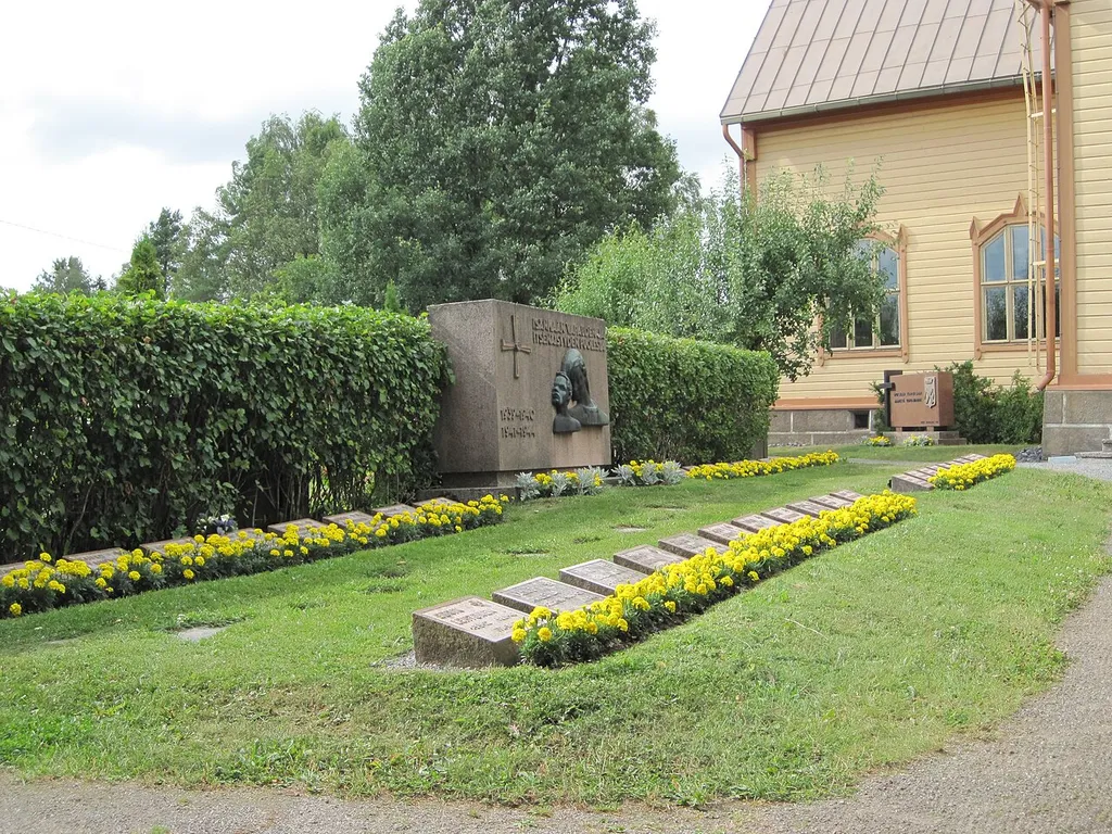 Military cemetary at Aura church in Aura, Finland. Relief by Jussi Vikainen (1907-1992), unveiled in 1956.