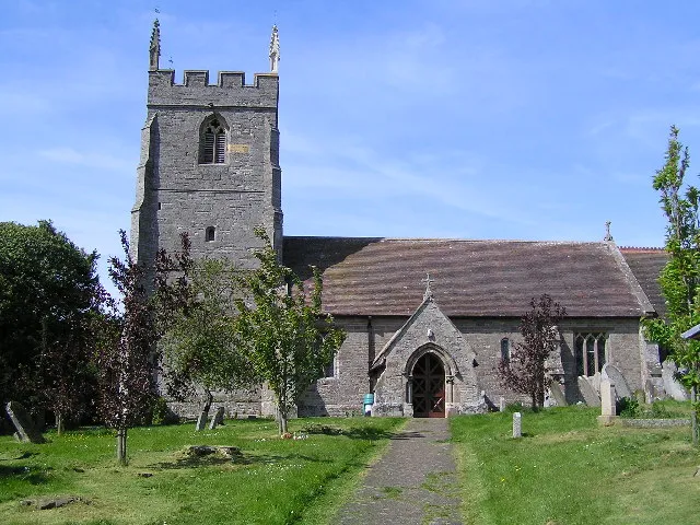 Nave and west tower of the parish church of St James the Greater, Bishampton, Worcestershire, seen from the south. The church was once a chapelry of Fladbury and was dedicated to St Peter. However, when the church was rebuilt in 1870–71 a figure carved for the pulpit proved to be St James and not St Peter. The church was rededicated to St James rather than remake the pulpit!