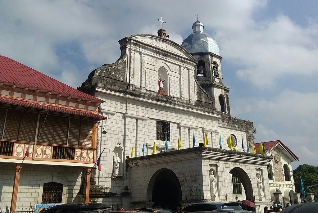 Diocesan Shrine of Saint Augustine, commonly known as the Parish of Santa Cruz, is a Roman Catholic Church in the municipality of Tanza, in the province of Cavite, Philippines. The shrine is under the jurisdiction of the Diocese of Imus. The patron saint of the town is Saint Augustine of Hippo commonly known as "Tata Usteng". The Holy Cross serves as the titular patron. The town patronal feast is celebrated annually every August 28.