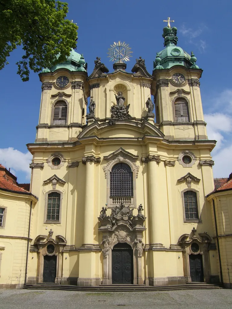 10The Fassade of the baroque Jadwiga church in Legnickie Pole, seen from western direction. The builder was the famous Kilian Ignaz Dientzenhofer and erected this building from 1727-1731. On the roof of the twin towers, there are crowns of the silesian dukes.