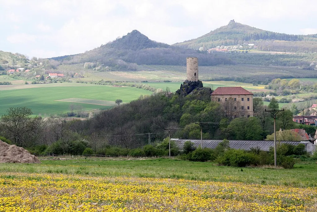 České středohoří, Czech Republic. A view from Sutom over Skalka Castle in Vlastislav towards WSW with hills of Plešivec (centre) and Oltářík (right) in the background.