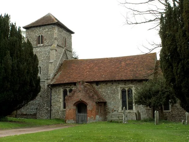 St. Mary's church, Sturmer, Essex. Sturmer lies south-east of Haverhill, on the Suffolk/Essex border. The church stands to the west of the A.1017 road, where the village lies. It was built by the Normans, then a tower was added in the 14th century and the charming south brick porch in the 16th century.