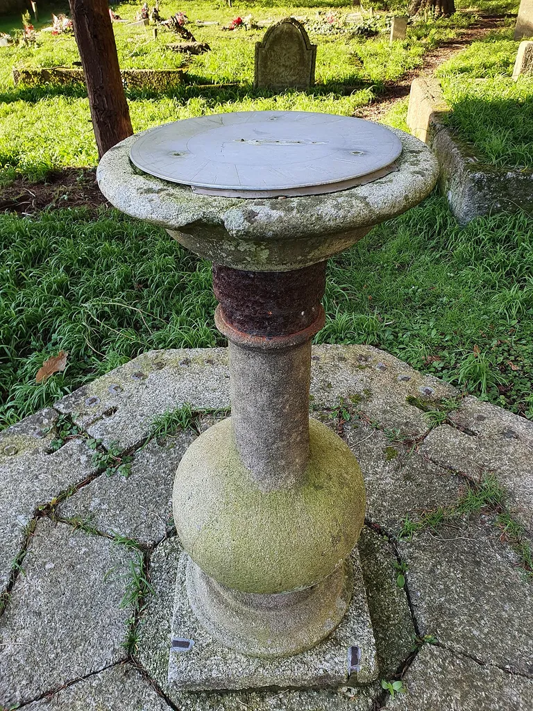 18th-century, grade II listed sundial in St Michael's, Helston churchyard. Restored in 1986.
