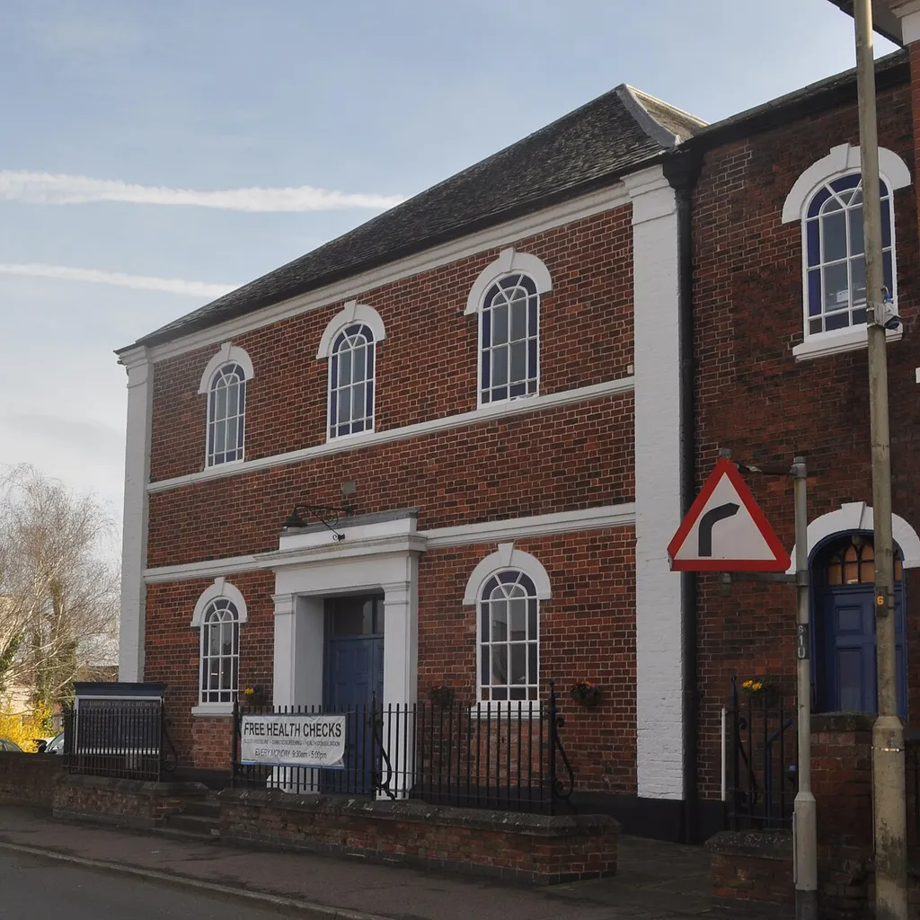 George Street Church (7DA, formerly United Reformed), George Street, Lutterworth, Harborough District, Leicestershire, England. Built in 1777 for Congregationalists; used by the United Reformed Church until around 2020; now home to a Seventh-day Adventist congregation. This is a photo of listed building number 1211075.