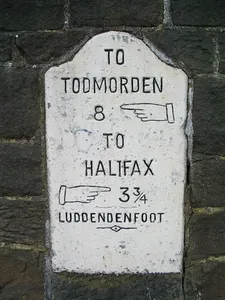 Milepost Set In Wall Opposite United Reformed Church