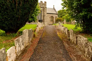 Series Of Adjacent Headstones Lining Both Sides Of Path Approximately 3-9 Metres South Of Church Porch