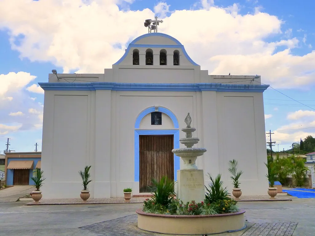 The historic Church of the Immaculate Conception (built prior to 1831), located on the town plaza in Vega Alta, Puerto Rico, is listed on the U.S. National Register of Historic Places.