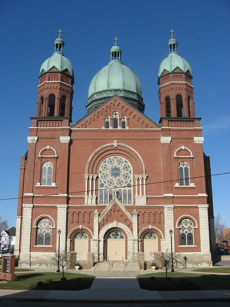 Front of Immaculate Conception Catholic Church, located on the northwestern corner of the intersection of Anthony and Walnut Streets in downtown Celina, Ohio, United States. Built in 1903, the church was listed on the National Register of Historic Places as a part of the Cross-Tipped Churches of Ohio Thematic Resources.