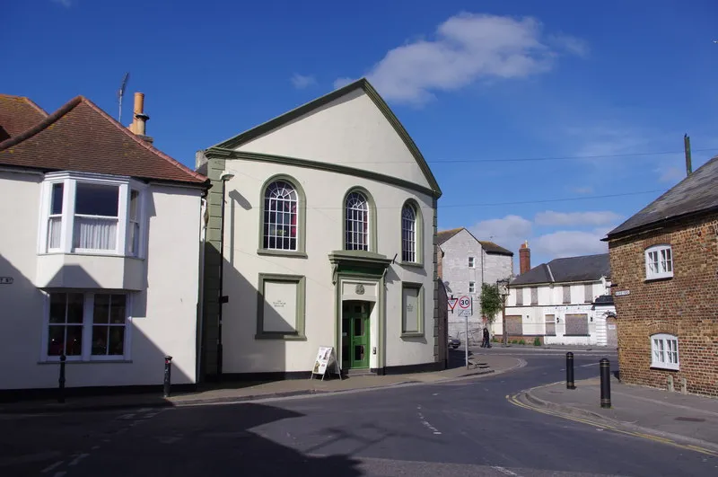 Dorchester - Teddy Bear Museum. The Dorset Teddy Bear Museum includes a Teddy Bear House and has displays of antique and other teddy bears. Bears on display in the museum include Paddington Bear, Rupert Bear, and Winnie the Pooh.