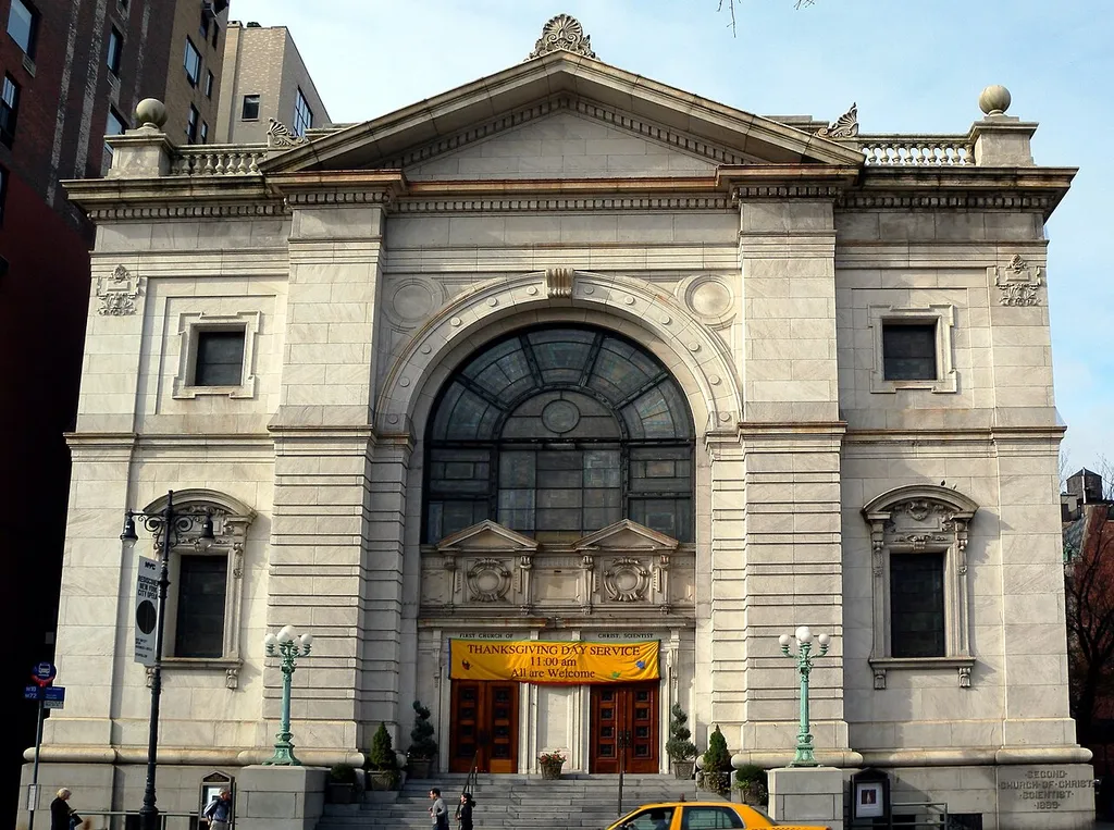 Lookng west across Central Park West at Church of Christ, Scientist on 68th Street on a sunny early afternoon.