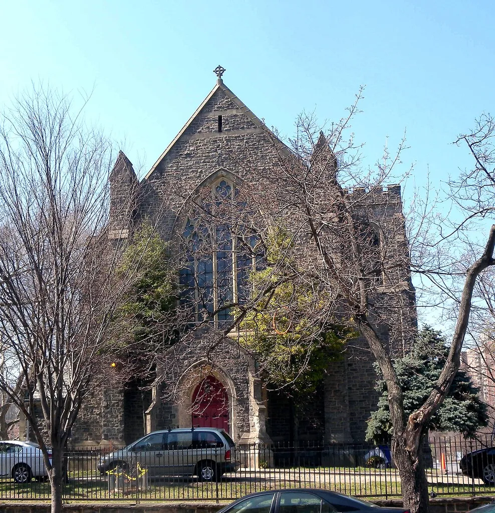 Looking west across Kingsbridge Avenue at en:Episcopal Church of the Mediator (Bronx, New York) on a sunny midday.