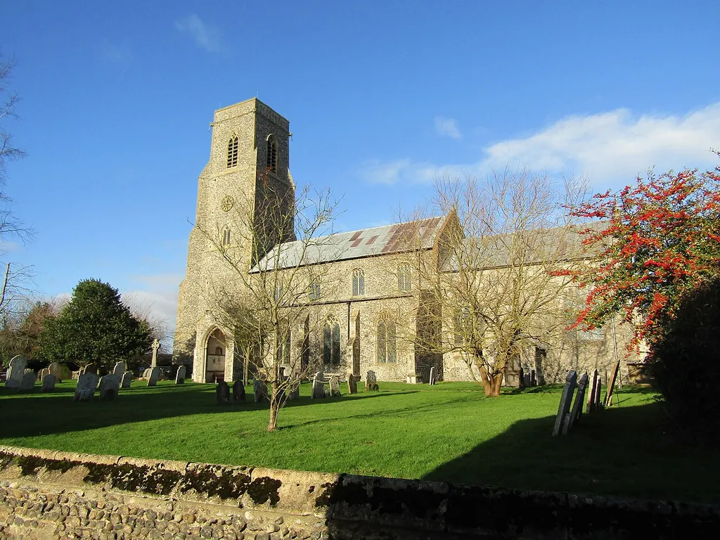 The south facing elevation of Saint Botolphs parish church within in the village of Trunch, Norfolk, England.
