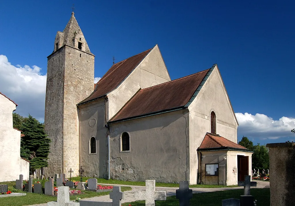 Parish church of St. Lorenzen am Steinfelde (municipality Ternitz, Lower Austria). On top of the tower the rare Spire lights.