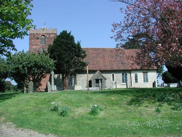 St. Mary's Moreton The parish church viewed from the road.