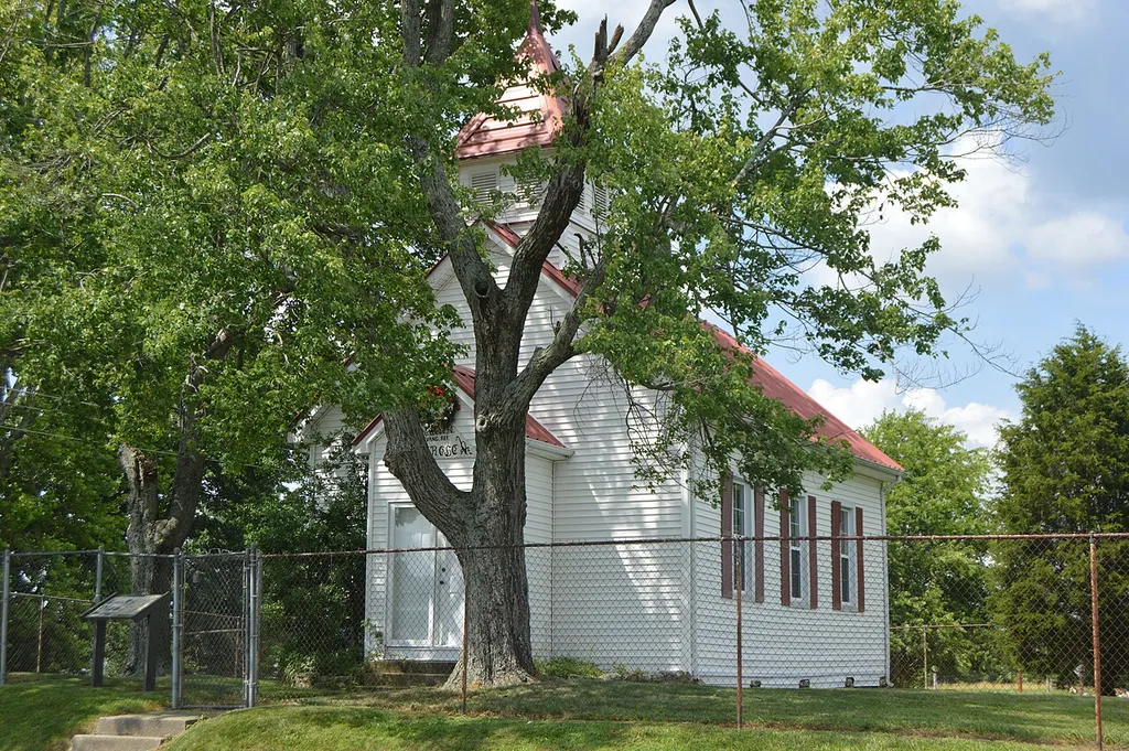 Front and eastern side of the former First Evangelical Reformed Church, located on Hawk Creek Road at Bernstadt in Laurel County, Kentucky, United States. Built in 1884, it is listed on the National Register of Historic Places.