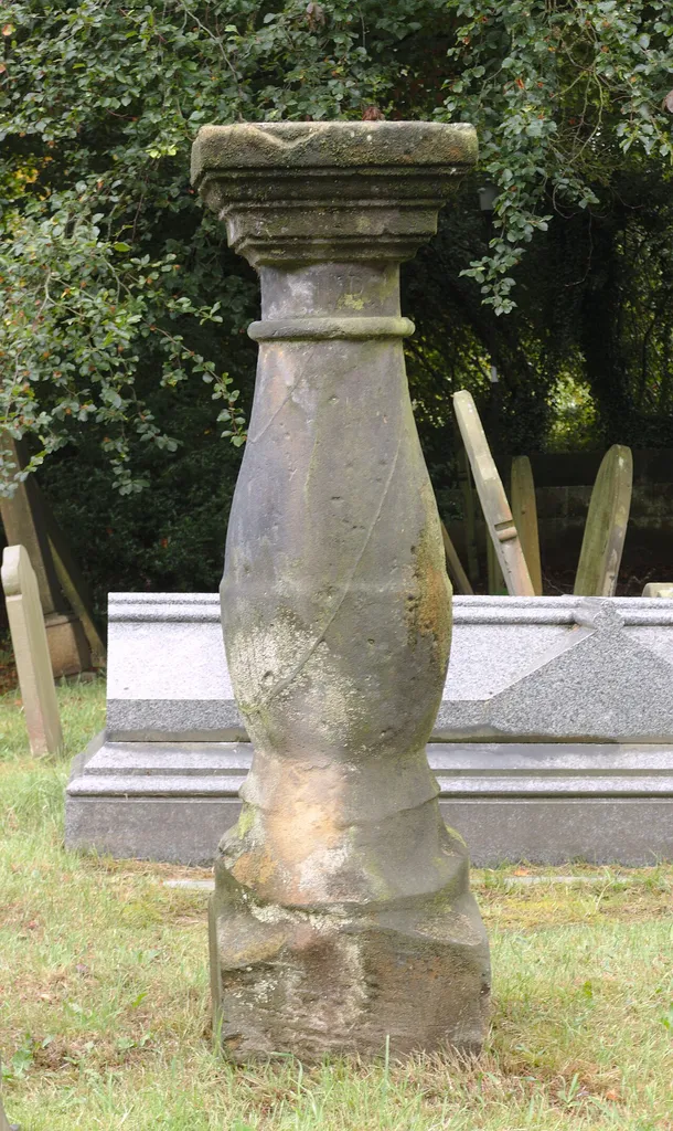 Grade II listed sundial, dating to probably C18. Described as "Stone baluster with square cap and octagonal plate with gnomon", but the plate and gnomon are now missing.