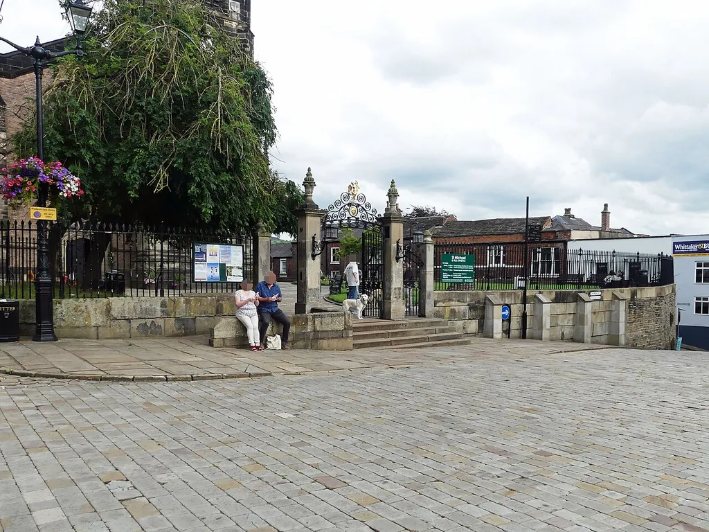 Churchyard walls, railings, gates and gate piers of Church of St Michael: Grade II listed building in Macclesfield. .mw-parser-output .messagebox{margin:4px 0;width:auto;border-collapse:collapse;border:2px solid var(--border-color-progressive,#6485d1);background-color:var(--background-color-neutral-subtle,#fbfcff);color:var(--color-base,#202122);box-sizing:border-box;border-inline-start-width:8px}.mw-parser-output .messagebox.mbox-small{font-size:88%;line-height:1.25em}.mw-parser-output .mbox-warning,.mw-parser-output .mbox-speedy{border:2px solid var(--border-color-error,#b22222);background:var(--background-color-error-subtle,#ffdbdb);border-inline-start-width:8px}.mw-parser-output .mbox-serious,.mw-parser-output .mbox-delete,.mw-parser-output .mbox-stop{border:2px solid var(--border-color-error,#b22222);border-inline-start-width:8px}.mw-parser-output .mbox-issue,.mw-parser-output .mbox-content{border:2px solid #f28500;background:var(--background-color-warning-subtle,#ffe);border-inline-start-width:8px}.mw-parser-output .mbox-query,.mw-parser-output .mbox-style{border:2px solid #f4c430;background:var(--background-color-warning-subtle,#ffe);border-inline-start-width:8px}.mw-parser-output .mbox-shit{border:2px solid #960;border-inline-start-width:8px}.mw-parser-output .mbox-license{border:2px solid #88a;border-inline-start-width:initial}.mw-parser-output .mbox-legal{border:2px solid var(--border-color-notice,#666);background:var(--background-color-base,#fff);border-inline-start-width:8px}.mw-parser-output .mbox-honor{border:2px solid #ca3;background:var(--background-color-warning-subtle,#fcf4db);border-inline-start-width:8px}.mw-parser-output .mbox-growth{border:2px solid #8d4;background:var(--background-color-success-subtle,#d5fdf4);border-inline-start-width:8px}.mw-parser-output .mbox-move{border:2px solid #93c;border-inline-start-width:8px}.mw-parser-output .mbox-protection,.mw-parser-output .mbox-message{border:2px solid var(--border-color-base,#aaa);border-inlin