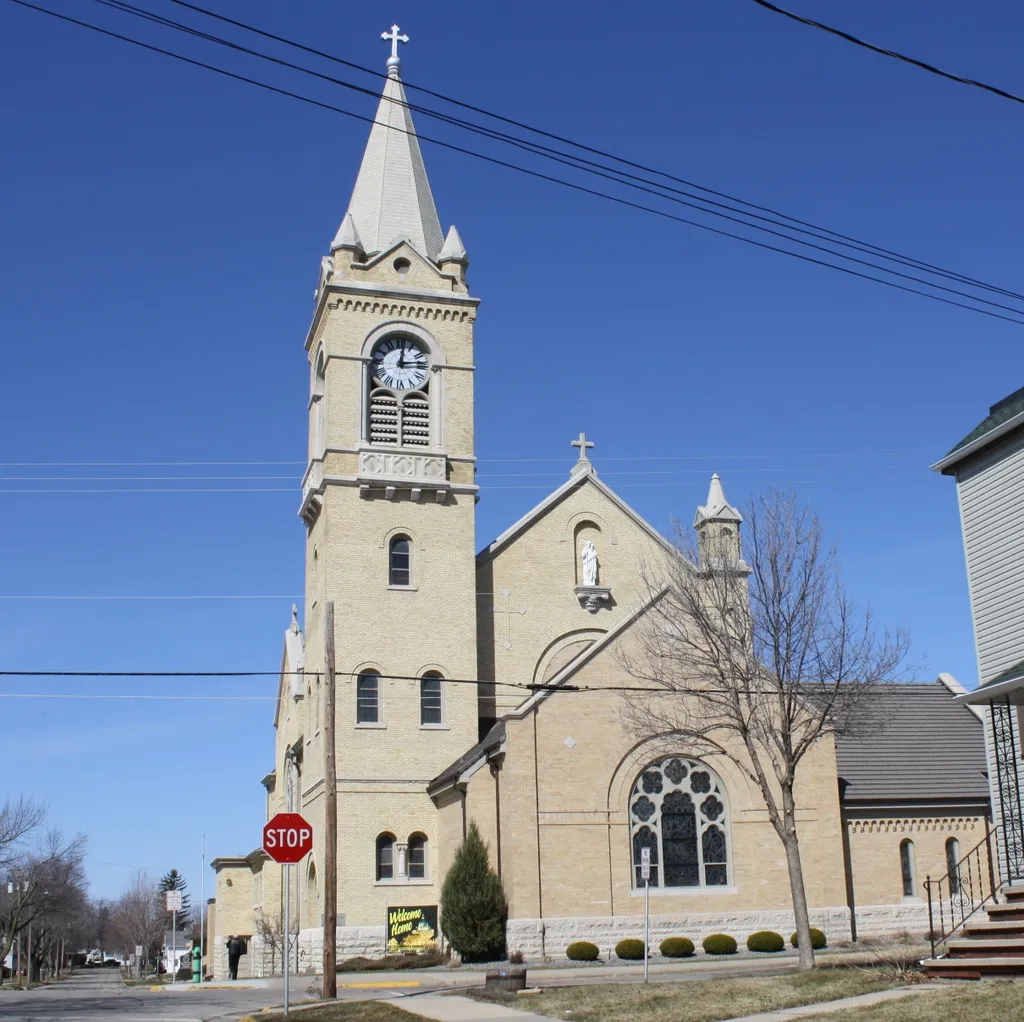The Holy Cross Church in w:Kaukauna, Wisconsin, listed on the National Register of Historic Places. This file was uploaded with Commonist.