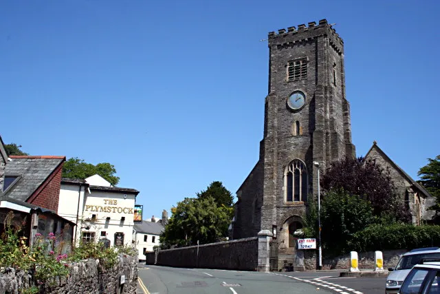 View northeast up Church Road, Plymstock, Devon. On the left is The Plymstock pub. On the right is St Mary and All Saints parish church.