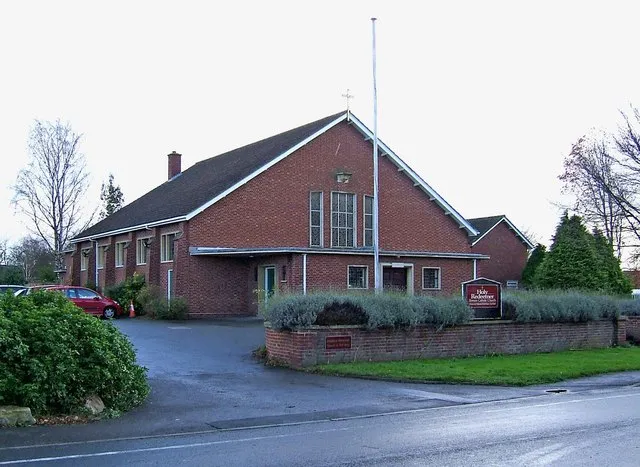 Holy Redeemer Roman Catholic Church, Priest Lane Appropriately Pershore's Catholic church is to be found in Priest Lane, which no doubt got its name centuries ago from the nearby Pershore Abbey. The church was built in 1958-59 to the design of Hugh Bankart of Bath.