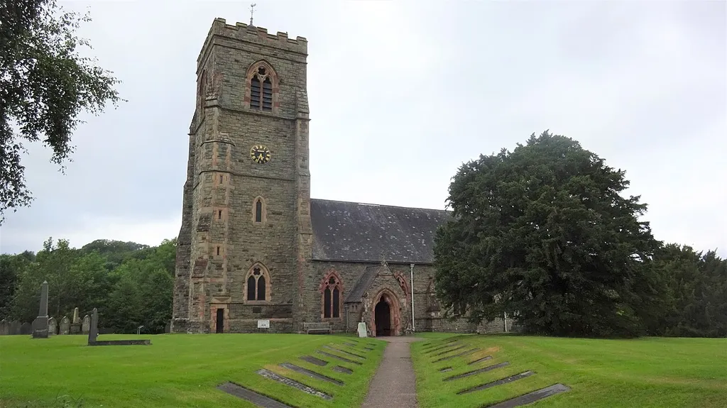 St Mary's Church, Llanfair Caereinion, Powys, Wales. The parish church with St Mary's Well nearby.