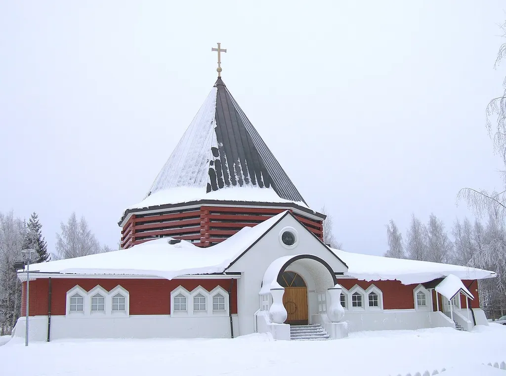 The church of the Holy Family of Nazareth Parish in Koskela neighbourhood, Oulu, Finland. The catholic parish of Oulu includes the provinces of Northern Ostrobothnia and Lapland. The church was designed by architect Gabriele Geronzi and it was built in the year 2000. Weather: –5°C