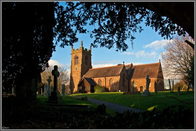St Michael's Church, near to Child's Ercall, Shropshire, Great Britain. This church has 13th Century arcades although the Chancel was added in 1879 by Carpenter and Ingelow. The base of the sundial, south of the Church, is the stump of the original early cross, where missionaries - and later friars - preached in the 6th and 7th centuries. The sundial itself is dated 1713. Unfortunately there are no remains of the earliest church which was probably of a "daub &amp; wattle" construction in the 6th century. In the Doomsday Book of 1086 it is recorded that there was a priest in Childs Ercall, and there still remains the small round-headed window frame, at the east end of the north aisle, from the early stone built Norman church. In 1897 this was moved from the chancel and glazed. In the 13th century aisles were added to the original stone building. The southern arcade of four bays has circular piers and Early English moulded capitals, as is the western pier of the north arcade. The remaining piers, which came later, are octagonal with double chamfered arches. The unusual font also dates from the 13th century, as does the priest's door in the south wall of the chancel. This was carefully dismantled and re-erected when the chancel was rebuilt in 1879 by Carpenter and Ingelow. In the 14th century much of the church was rebuilt and the south aisle, with the piscina in the south wall and the hagioscope, through which the priest could be seen from the south door, date from this period. The tower, the west end of the nave and the west window are late 15th Century. In the inventory of 1552 are listed:- One chalice of silver, three great bells, one sanctus bells There are still the three bells. The tenor was re-cast about 1590, the Second in 1607 and again in 1868 and the treble was recast in about 1700 These bells were rung for a service for the first time for about 30 years on Sunday, 29th July 2001 for the United Benefice Service, thanks to many weeks of work to the bells by 