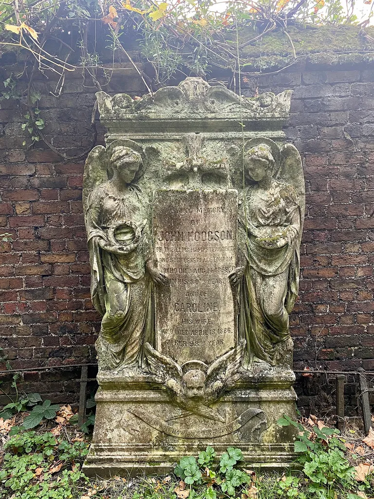 Tomb of John Hodgson in the churchyard of St John-at-Hampstead .mw-parser-output .messagebox{margin:4px 0;width:auto;border-collapse:collapse;border:2px solid var(--border-color-progressive,#6485d1);background-color:var(--background-color-neutral-subtle,#fbfcff);color:var(--color-base,#202122);box-sizing:border-box;border-inline-start-width:8px}.mw-parser-output .messagebox.mbox-small{font-size:88%;line-height:1.25em}.mw-parser-output .mbox-warning,.mw-parser-output .mbox-speedy{border:2px solid var(--border-color-error,#b22222);background:var(--background-color-error-subtle,#ffdbdb);border-inline-start-width:8px}.mw-parser-output .mbox-serious,.mw-parser-output .mbox-delete,.mw-parser-output .mbox-stop{border:2px solid var(--border-color-error,#b22222);border-inline-start-width:8px}.mw-parser-output .mbox-issue,.mw-parser-output .mbox-content{border:2px solid #f28500;background:var(--background-color-warning-subtle,#ffe);border-inline-start-width:8px}.mw-parser-output .mbox-query,.mw-parser-output .mbox-style{border:2px solid #f4c430;background:var(--background-color-warning-subtle,#ffe);border-inline-start-width:8px}.mw-parser-output .mbox-shit{border:2px solid #960;border-inline-start-width:8px}.mw-parser-output .mbox-license{border:2px solid #88a;border-inline-start-width:initial}.mw-parser-output .mbox-legal{border:2px solid var(--border-color-notice,#666);background:var(--background-color-base,#fff);border-inline-start-width:8px}.mw-parser-output .mbox-honor{border:2px solid #ca3;background:var(--background-color-warning-subtle,#fcf4db);border-inline-start-width:8px}.mw-parser-output .mbox-growth{border:2px solid #8d4;background:var(--background-color-success-subtle,#d5fdf4);border-inline-start-width:8px}.mw-parser-output .mbox-move{border:2px solid #93c;border-inline-start-width:8px}.mw-parser-output .mbox-protection,.mw-parser-output .mbox-message{border:2px solid var(--border-color-base,#aaa);border-inline-start-width:8px}.mw-parser-output .messagebox .mbox