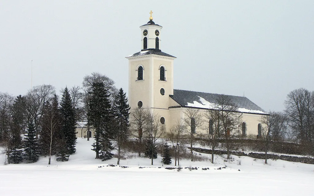 Kuddby, Vikbolandet, Sweden: the parish church and its surroundings.