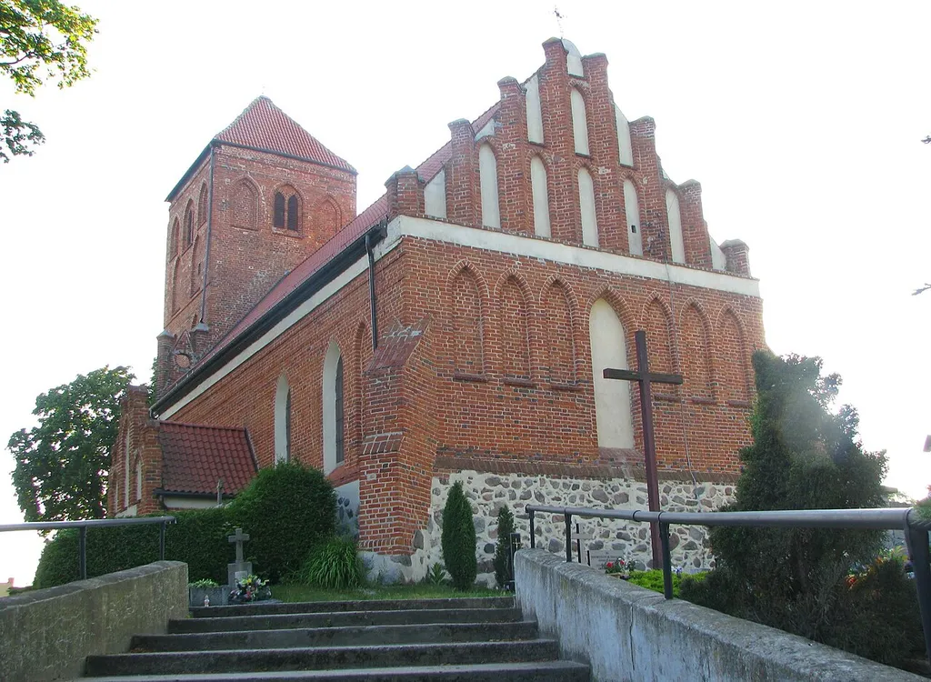 Łąkorz - rzymskokatolicki kościół parafialny pw. św. Mikołaja, pocz. XIV, XX