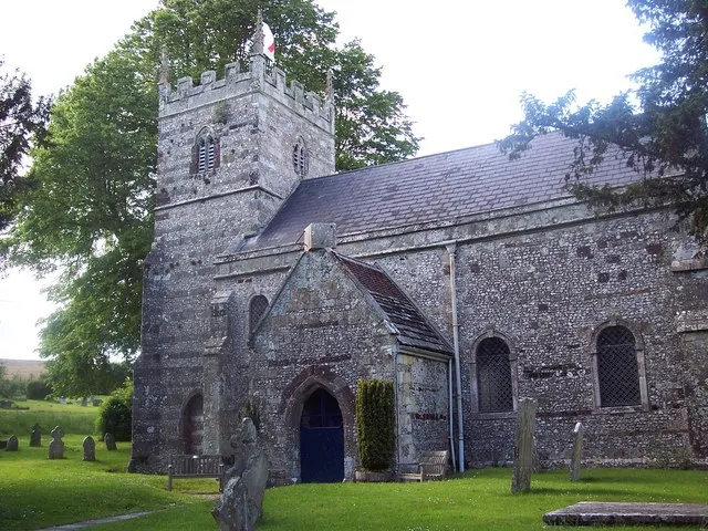The Parish Church of St Mary the Virgin, Winterborne Stickland The church is built of flint and is 13th century.